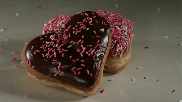 Doughnuts falling and bouncing in ultra slow mo 1500fps - reflective surface - DOUGHNUTS PHANTOM 020