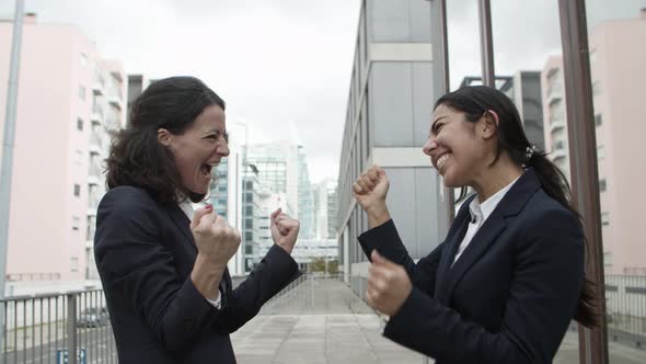 Content Businesswomen Celebrating Success