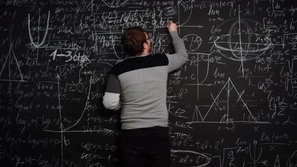 Student Solves the Equation at the Blackboard and Makes a Mistake Then Corrects It