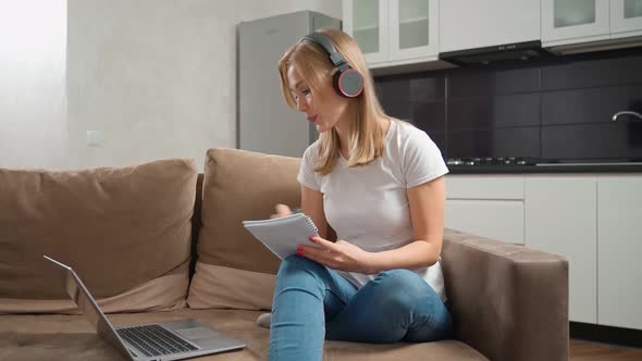 Woman Headphones Having Online Courses Laptop