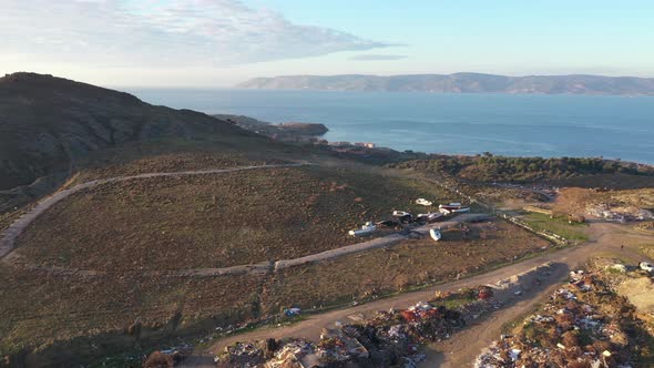 Aerial over lifejacket graveyard Lesvos Island Turkish coat distance