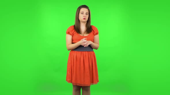 Cute Girl Talking About Something Then Making a Hush Gesture, Secret. Green Screen