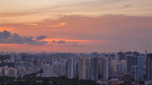 4k day to night Time-lapse of cityscape view of Singapore city at sunset