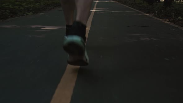 Low Angle Shot of Man Training for Marathon Run