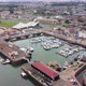 Drone View of the Boat Stop with the Town and the Sea in the Background - VideoHive Item for Sale