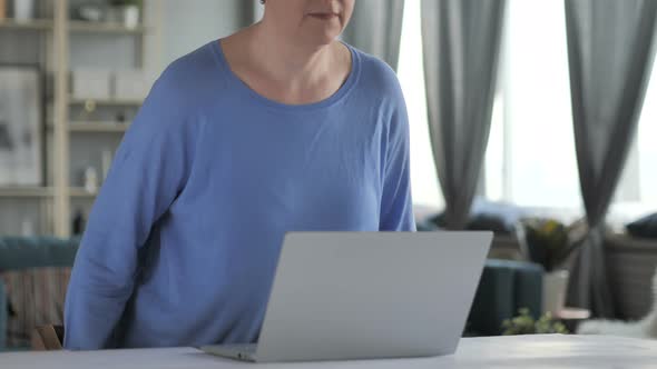 Old Woman Leaving Office