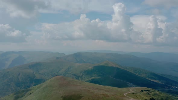 Aerial Drone View. Green Mountains Without Trees, on a Background of Blue Sky Svydovets Dragobrat V2
