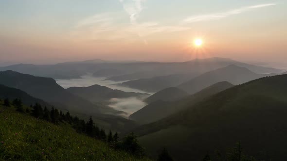 Sunrise in Mountain Valley Time Lapse. Mist Foggy Morning