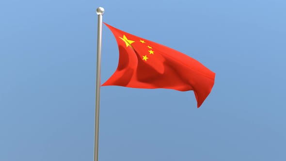 Chinese flag on flagpole.