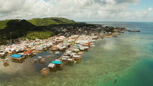 Fishing Village and Houses on Stilts. Dapa City, Siargao, Philippines