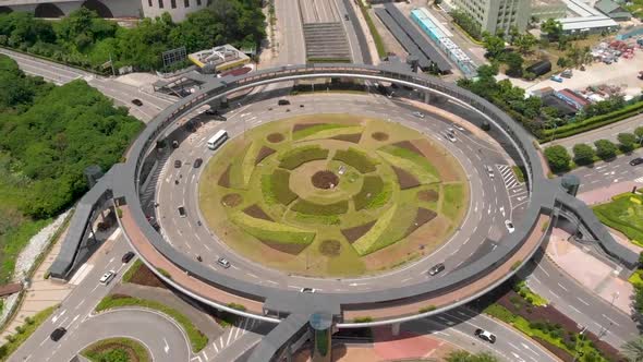 Forward aerial of roundabout at Cotai Strip in Macau on sunny day