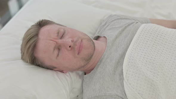 Man Waking Up From Nightmare