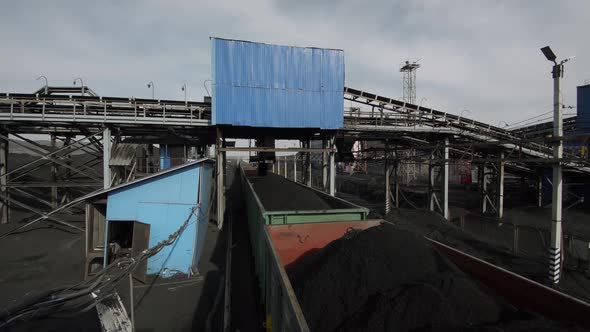 General View of the Coal Mine Loading Station with Moving Freight Train