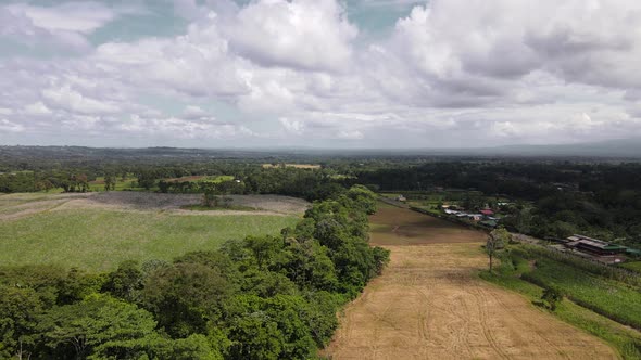 4k aerial footage of Costa Rican farmland in the province of Alajuela. Green season in central Ameri