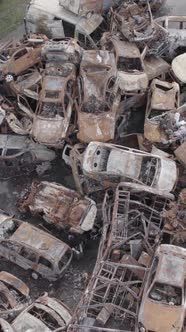 Vertical Video of a Dump of Destroyed Cars During the War in Ukraine