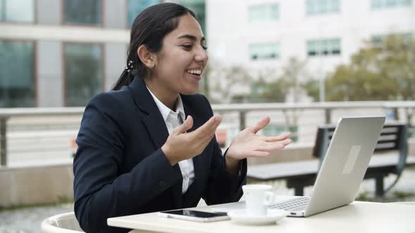 Businesswoman Having Video Chat Via Laptop