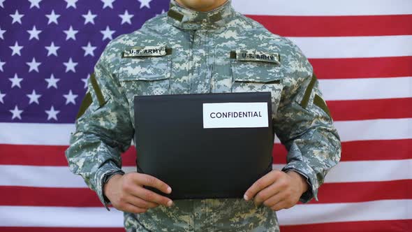 Soldier Holding Confidential Folder in Hands, Secret Agency Information Security
