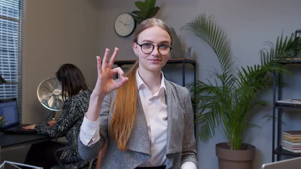 Cheerful Female Girl Manager Showing Ok Approval Gesture Satisfied with Good Results of Work