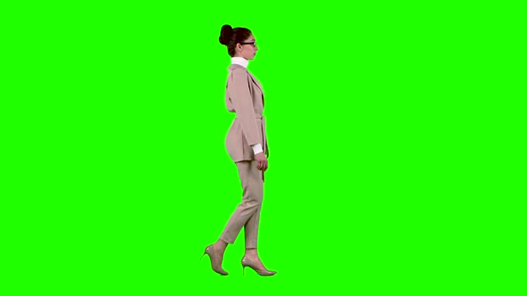 Woman Flirting Correcting Glasses. Green Screen. Side View