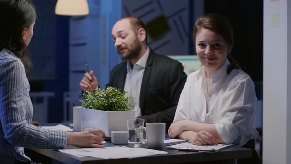 Portrait of Focused Businesswoman Looking Into Camera Working in Office Meeting Room