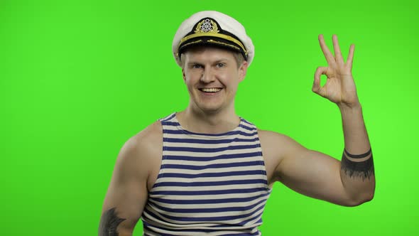 Young Sailor Man Shows Ok Sign, Looking at Camera. Seaman Guy in Sailor's Vest