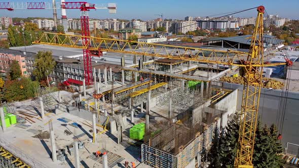 Cranes and building construction site