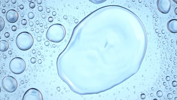 Super Slow Motion Macro Shot of Rippling Real Water Blobs at 1000Fps alt