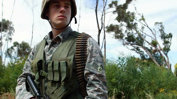 Military soldier during training exercise with weapon