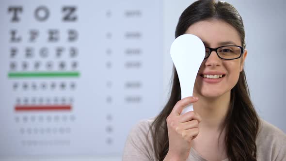 Smiling Lady in Glasses Closing Eye, Smiling and Nodding, Correct Lens Diopter