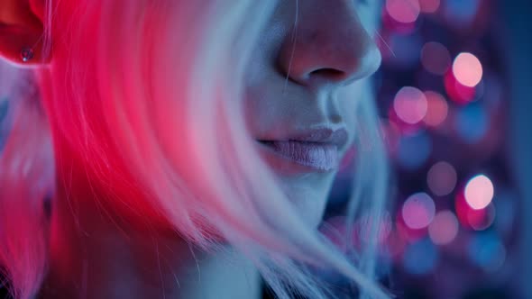 Portrait of Young Sexy Playful Blond 30s Woman in Bright Colourful Light Pink