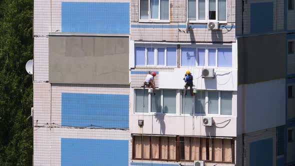 Two Industrial Climber, Insulation Facade of High-rise Building Using Styrofoam