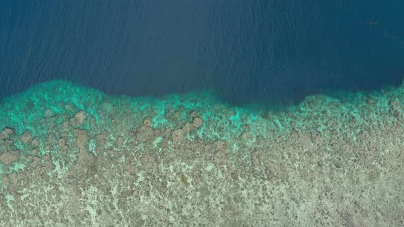 Aerial: flying over Hatta island coral reef Banda Islands Maluku Indonesia