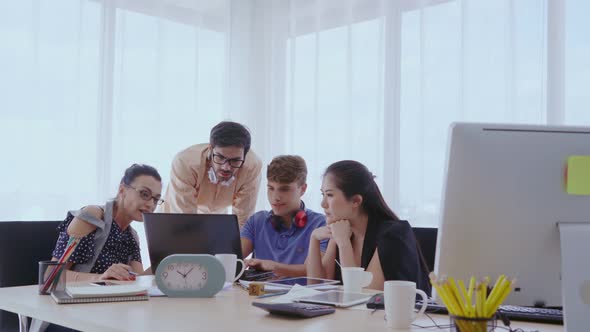 Successful Business People Celebrating Project Success at Office