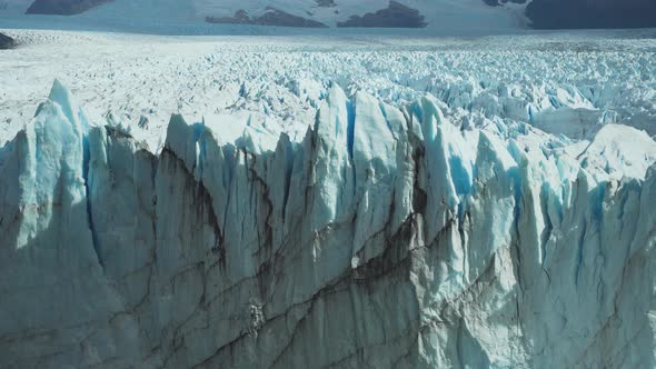 Panning right shot of endless spikes of ice on Perito Moreno Glacier