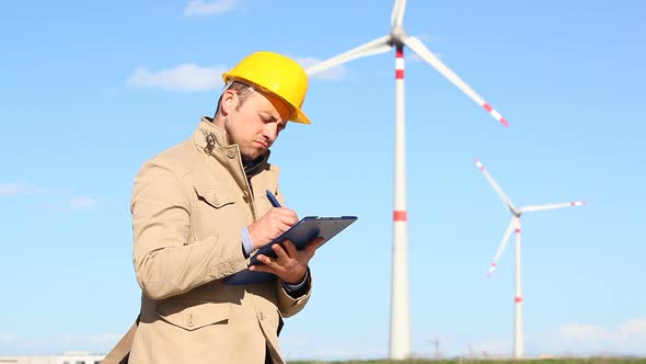 Engineer at Work in a Wind Turbine Power Station