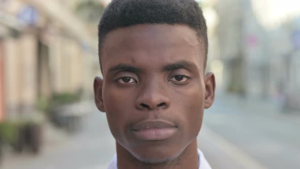 Face Close Up of African Man Looking at Camera