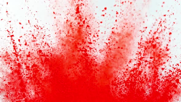 Super Slowmotion Shot of Red Powder Explosion Isolated on White Background