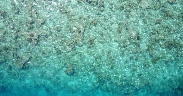 Beautiful drone abstract view of a white sand paradise beach and turquoise sea background in colourful