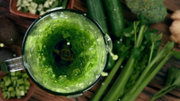 Super Slow Motion Shot of Mixing Fresh Green Vegetable Smoothie at 1000 Fps