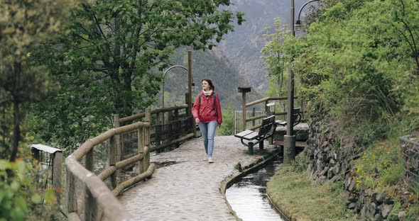 Andorra La Vella, Andorra. Young Active Caucasian Woman Walking Hiking On Rec Del Sola Irrigation