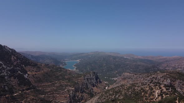 Aerial Nature Greek Landscape with Sea Mountain Olive Trees and Houses in Crete