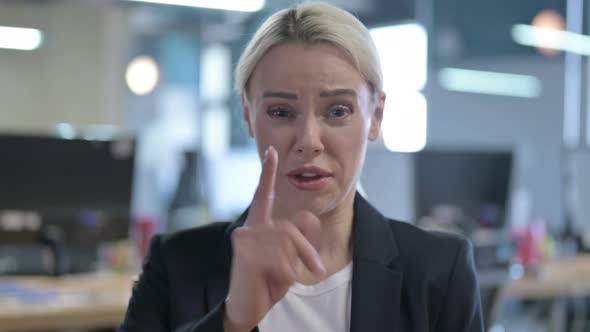 Portrait of Businesswoman Shouting and Screaming with Anger