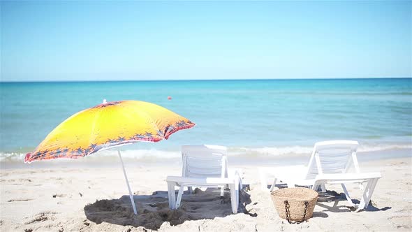 View of the Beach with Chairs and Umbrellas