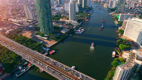 4K UHD : Bangkok River drone view. Flying over the Chao Phraya River