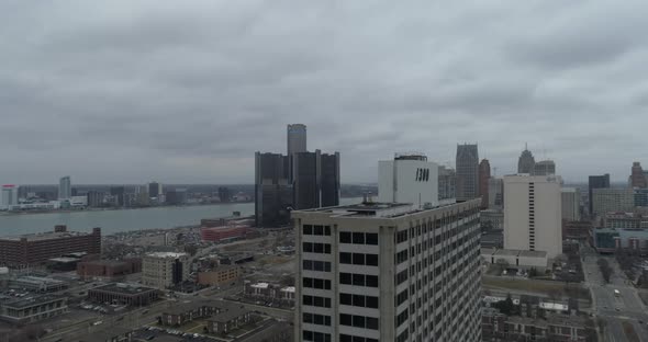 Aerial view of downtown Detroit and surrounding neighborhood on a cloudy and gloomy day. This video