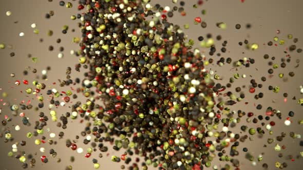 Super Slow Motion Shot of Pepper Seasoning Side Collision on Brown Background at 1000Fps.