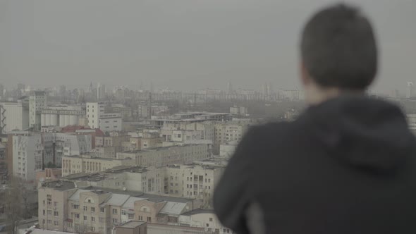 A Man Looks at a Big City. Kyiv. Ukraine.