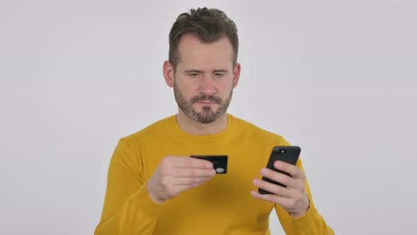 Portrait of Middle Aged Man Having Online Payment Failure on Smartphone