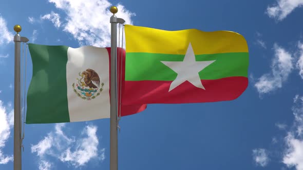 Mexico Flag Vs Myanmar Flag On Flagpole