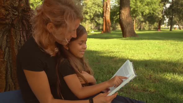 Family Spending Time By Reading